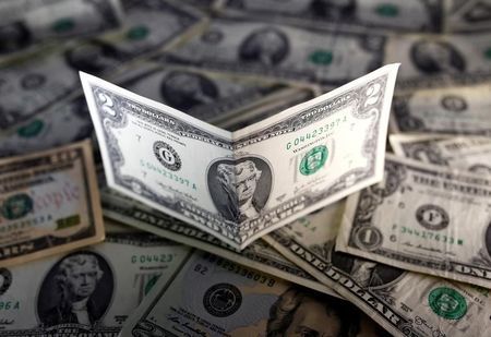 Dollar hits 14-year high as Trump-fueled bond sell-off resumes